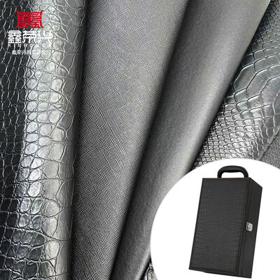 Mayorista de PVC cuero de imitación cartera caja zapatos cuaderno lichi animal tejido cruzado patrón artificial tela de cuero sintético