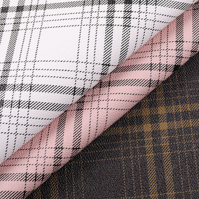 Las bolsas son de tejido de cuero falso de impresión de PVC de color cuadrado rayado resistente a los arañazos artificiales.