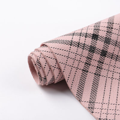 Las bolsas son de tejido de cuero falso de impresión de PVC de color cuadrado rayado resistente a los arañazos artificiales.