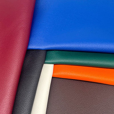 Fábrica mayorista de PVC 0.6mm Litchi textura de cuero falso Relieve de cuero sintético artificial para el asiento del coche bolso de pie decorativo