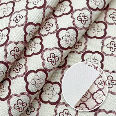 Pvc Cuatro hojas de trébol estilo impreso Cuero artificial sintético para bolsas embalaje portátil teléfono concha tela de cuero falso