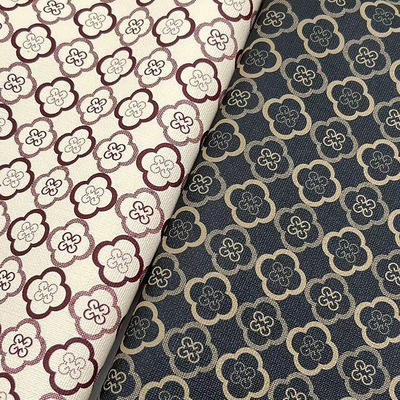 Pvc Cuatro hojas de trébol estilo impreso Cuero artificial sintético para bolsas embalaje portátil teléfono concha tela de cuero falso