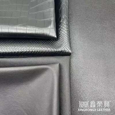 Mayorista de PVC cuero de imitación cartera caja zapatos cuaderno lichi animal tejido cruzado patrón artificial tela de cuero sintético