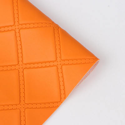 Cuero sintético artificial estilo repujado con perforaciones de rombos de PVC para asientos de coche, sofás, decoración de bolsos y tela de cuero sintético