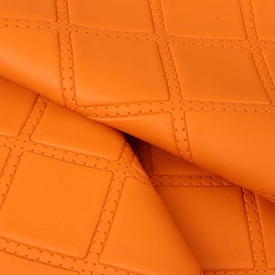 Cuero sintético artificial estilo repujado con perforaciones de rombos de PVC para asientos de coche, sofás, decoración de bolsos y tela de cuero sintético