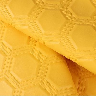 Cuero sintético artificial repujado hexagonal de bordado de PVC para asientos de coche, pies de coche, sofá, decorar bolsos, tela de cuero sintético