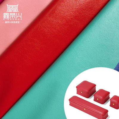 Cuero sintético artificial de grano PVC R64 para tela de cuero para zapatos, funda de cartera, cuaderno, paquete