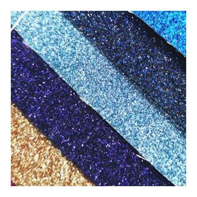 Por mayor PU Glitter en polvo grano de cuero sintético cartera de bolsillo zapatos portátil tejido de cuero