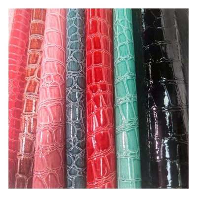 Patrón de piedra de alto brillo Pvc Patrón de piel sintética de animales Zapatos bolsos y bolsas Tejido de cuero falso