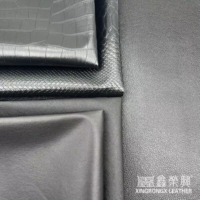 Mayorista de PVC cuero de imitación cartera caja zapatos cuaderno lichi animal tejido cruzado patrón artificial tela de cuero sintético