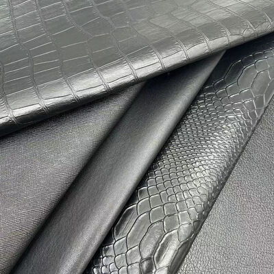 Mayorista de PVC cuero de imitación cartera caja zapatos cuaderno lichi animal tejido cruzado patrón artificial tela de cuero sintético