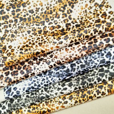 Por mayor Pvc Leopard Impreso Cuero Artificial Sintético para Bolsa Cuaderno Teléfono Cuero de mesa con concha Tejido de cuero falso