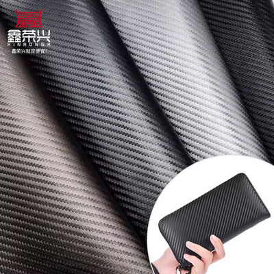 1.0 mm de espesor de fibra de carbono PU cuero sintético para bolsas billeteras cinturones coches boutiques material de cuero falso