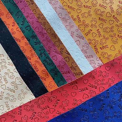 Fabrica de cuero sintético en relieve de color de la moda de vinilo de PU personalizado para muebles para bolsas de calzado Alfombras de mesa cubierta de sofá