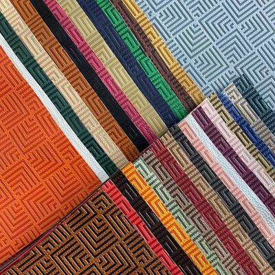 Fabrica de cuero sintético en relieve de color de la moda de vinilo de PU personalizado para muebles para bolsas de calzado Alfombras de mesa cubierta de sofá