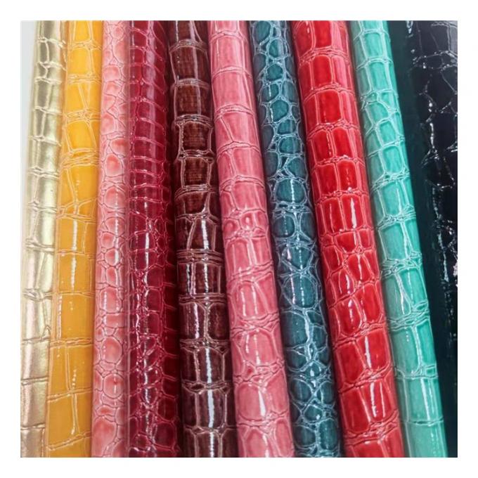 Patrón de piedra de alto brillo Pvc Patrón de piel sintética de animales Zapatos bolsos y bolsas Tejido de cuero falso 9